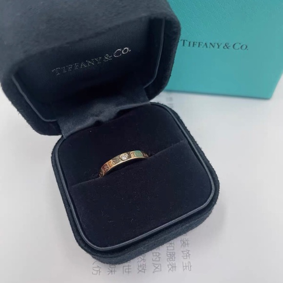 Tiffany & Co. Gold Ring with Diamond Accents - Picture 2 of 3